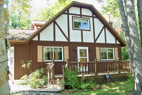 7020 Hollyglen Dr, Elmira, MI 49730