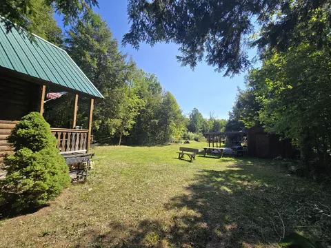 Exterior - 3807 Kamen Trl, Comins, MI 48619 photo 2 of 32