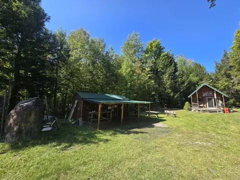 Exterior - 3807 Kamen Trl, Comins, MI 48619 photo 6 of 32