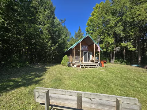 Exterior - 3807 Kamen Trl, Comins, MI 48619 photo 4 of 32