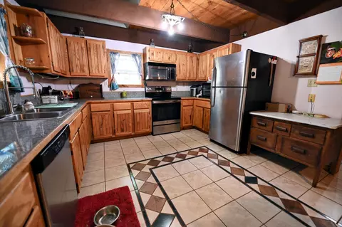Kitchen - 10396 S Maple Valley Rd, Gladwin, MI 48624 photo 3 of 4