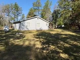 Exterior - 11491 Pines Trl, Roscommon, MI 48653 photo 4 of 8