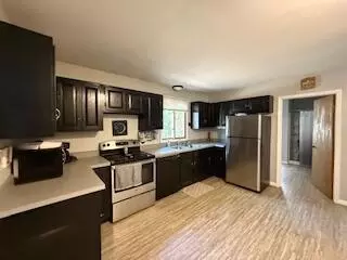 Kitchen - 11491 Pines Trl, Roscommon, MI 48653 photo 3 of 5