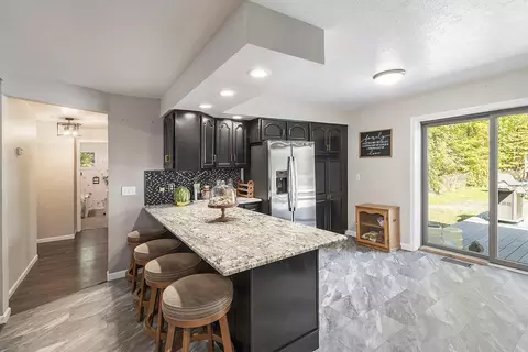 Kitchen - 2371 E Mullett Lake Rd, Indian River, MI 49749 photo 4 of 5