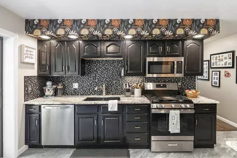 Kitchen - 2371 E Mullett Lake Rd, Indian River, MI 49749 photo 5 of 5