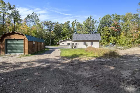 Exterior - 2371 E Mullett Lake Rd, Indian River, MI 49749 photo 9 of 13