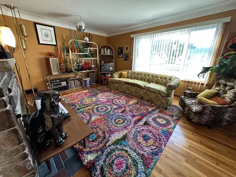 Living - 1302 S Third Ave, Alpena, MI 49707 photo 2 of 4