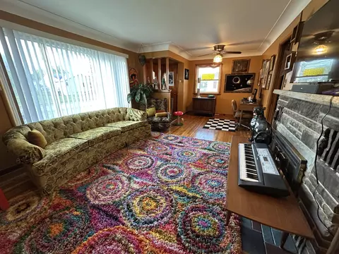 Living - 1302 S Third Ave, Alpena, MI 49707 photo 3 of 4