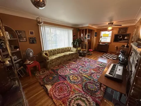 Living - 1302 S Third Ave, Alpena, MI 49707 photo 4 of 4