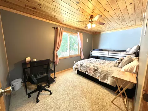 Bedroom - 1941 High Rd, Roscommon, MI 48653 photo 7 of 9