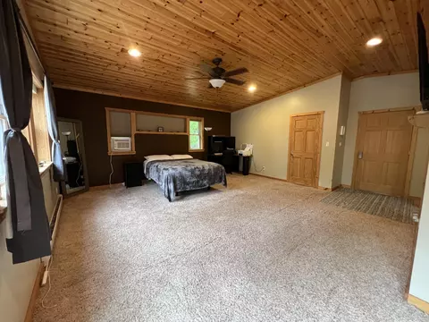Bedroom - 1941 High Rd, Roscommon, MI 48653 photo 1 of 9