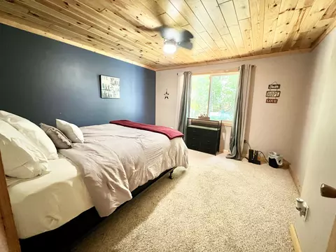 Bedroom - 1941 High Rd, Roscommon, MI 48653 photo 6 of 9