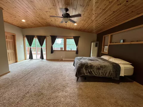 Bedroom - 1941 High Rd, Roscommon, MI 48653 photo 2 of 9