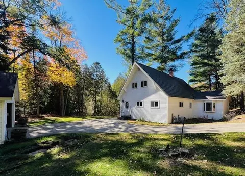 Exterior - 4593 Orbit Dr, Grayling, MI 49738 photo 6 of 12