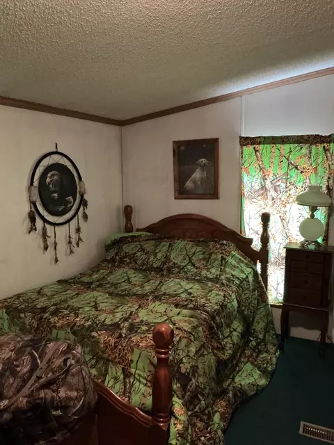 Bedroom - 2563 Delano Rd, Comins, MI 48619 photo 1 of 9