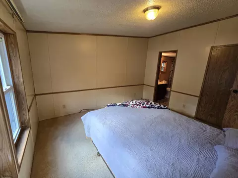 Bedroom - 156 N Dip Dr, Mio, MI 48647 photo 6 of 6