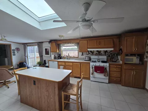 Kitchen - 1434 Rogers Road Rd, Fairview, MI 48621 photo 9 of 12