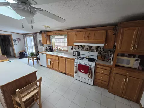Kitchen - 1434 Rogers Road Rd, Fairview, MI 48621 photo 10 of 12
