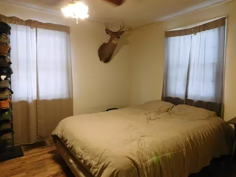 Bedroom - 11565 N Main St, Roscommon, MI 48653 photo 1 of 4