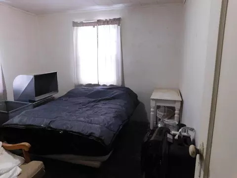 Bedroom - 11565 N Main St, Roscommon, MI 48653 photo 3 of 4