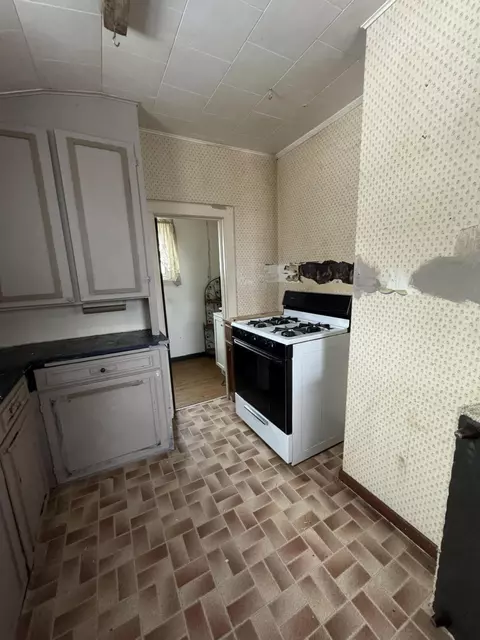 Kitchen - 511 Cedar St, Alpena, MI 49707 photo 2 of 2