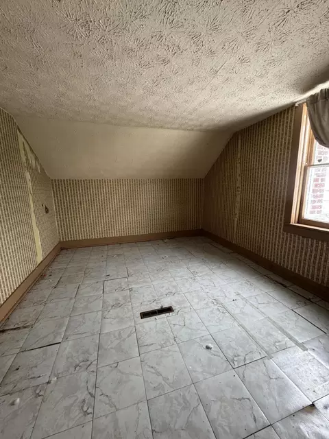 Bedroom - 511 Cedar St, Alpena, MI 49707 photo 2 of 4