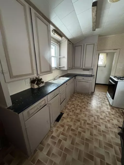 Kitchen - 511 Cedar St, Alpena, MI 49707 photo 1 of 2