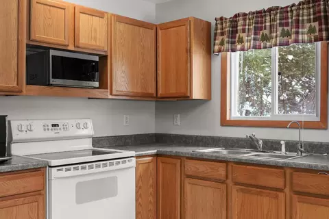 Kitchen - 120 Smiths Blvd, Roscommon, MI 48653 photo 3 of 4