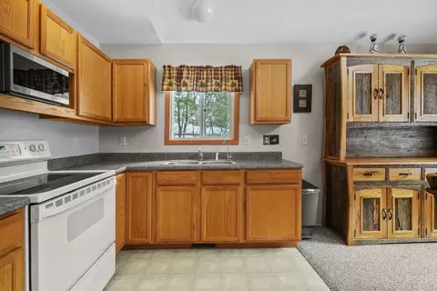 Kitchen - 120 Smiths Blvd, Roscommon, MI 48653 photo 2 of 4