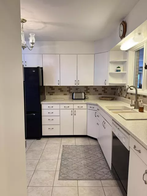 Kitchen - 190 Riverside Dr, Cheboygan, MI 49721 photo 2 of 3