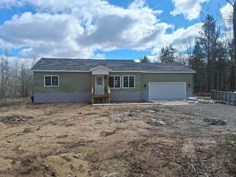 9183 Blackhawk Dr, Mancelona, MI 49659