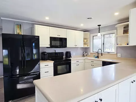Kitchen - 5423 N Cedar River Rd, Gladwin, MI 48624 photo 1 of 3