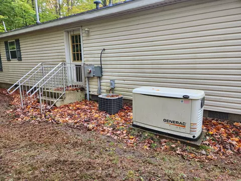 Exterior - 9852 Greenway Dr, Frederic, MI 49733 photo 2 of 2