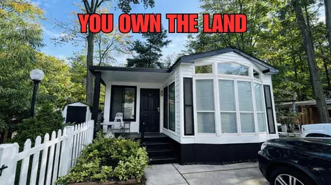 2757 Owens Unit 57 Dr, Houghton Lake, MI 48629