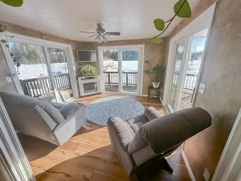 Living - 10845 Long Rapids Rd, Lachine, MI 49753 photo 1 of 2