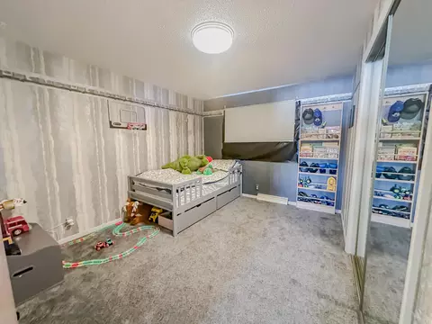 Bedroom - 10845 Long Rapids Rd, Lachine, MI 49753 photo 2 of 3