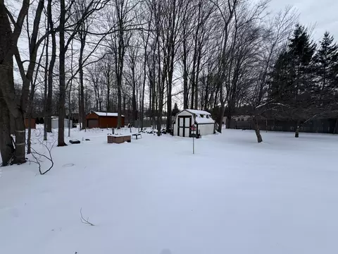 Exterior - 1744 Compton Ct, Grawn, MI 49637 photo 3 of 4