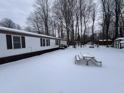 Exterior - 1744 Compton Ct, Grawn, MI 49637 photo 2 of 4