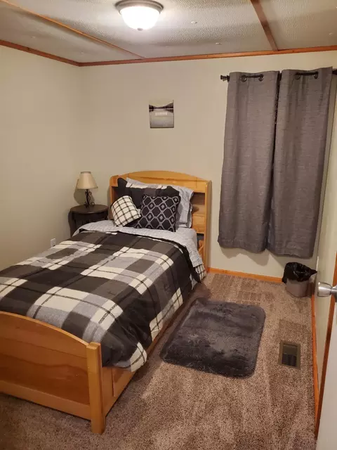 Bedroom - 208 Crestwood Dr, Grayling, MI 49738 photo 5 of 5