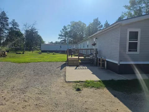 Exterior - 208 Crestwood Dr, Grayling, MI 49738 photo 3 of 10