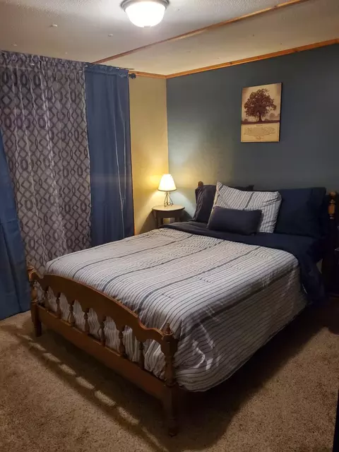 Bedroom - 208 Crestwood Dr, Grayling, MI 49738 photo 3 of 5