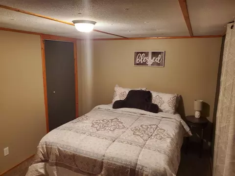 Bedroom - 208 Crestwood Dr, Grayling, MI 49738 photo 2 of 5