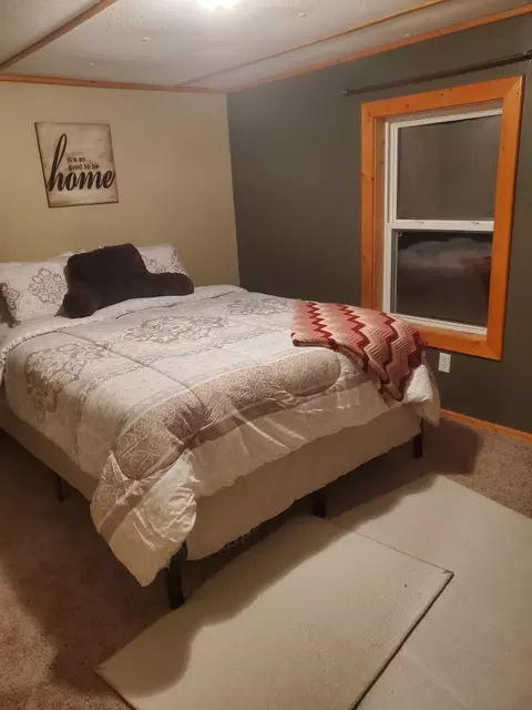 Bedroom - 208 Crestwood Dr, Grayling, MI 49738 photo 1 of 5