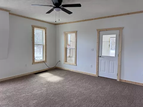 Living - 7588 Mill St, Vanderbilt, MI 49795 photo 1 of 3