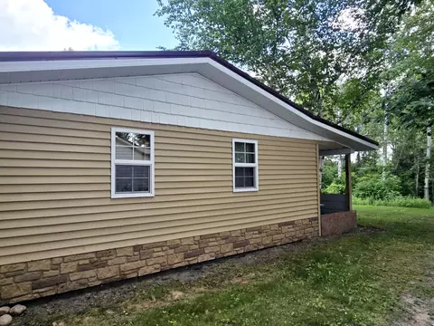Exterior - 6416 Jimary Ln, Gladwin, MI 48624 photo 5 of 9