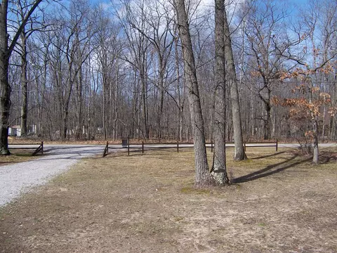 Exterior - 134 Bourbon St, Roscommon, MI 48653 photo 5 of 8