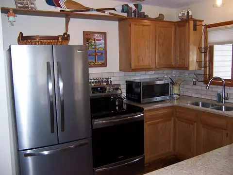 Kitchen - 134 Bourbon St, Roscommon, MI 48653 photo 2 of 3