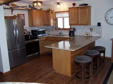 Kitchen - 134 Bourbon St, Roscommon, MI 48653 photo 1 of 3