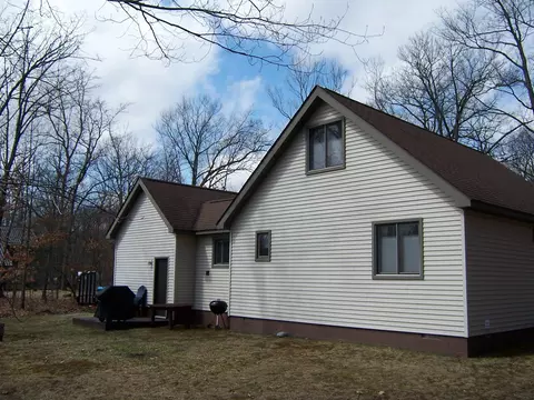 Exterior - 134 Bourbon St, Roscommon, MI 48653 photo 7 of 8