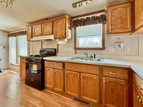 Kitchen - 305 Cedar St, Cheboygan, MI 49721 photo 1 of 5